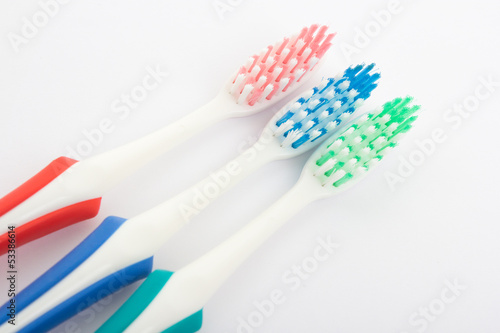Red  green and blue toothbrush