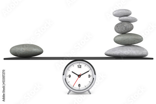 Photography Zen Stones balanced on a clock