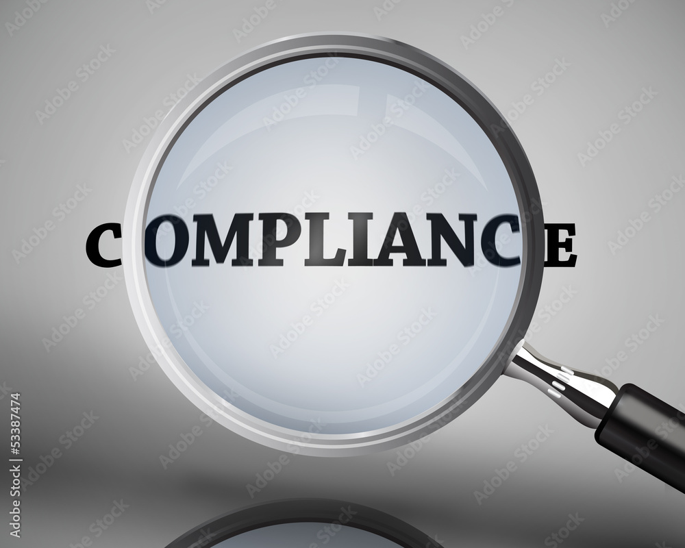 Magnifying glass showing compliance word Magnifying glass showing compliance word
