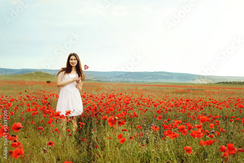 teen girl in poppy field