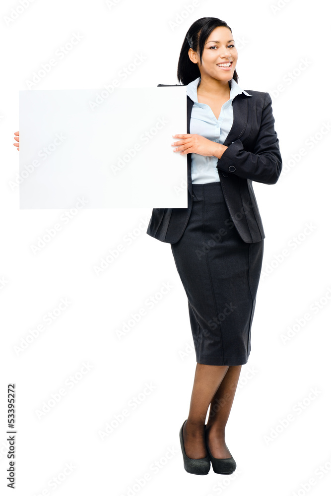 Happy mixed race business woman pointing at empty copy space iso
