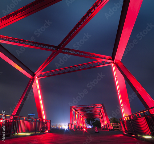 Fototapeta Naklejka Na Ścianę i Meble -  Steel structure bridge close-up at night landscape