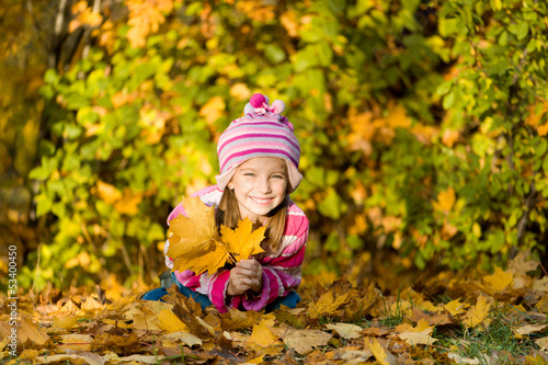 Autumn portrait of a little girl