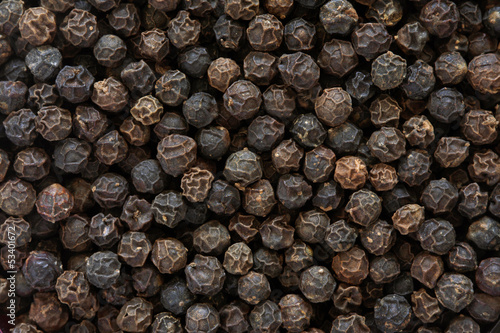 Closeup of dried black peppercorns