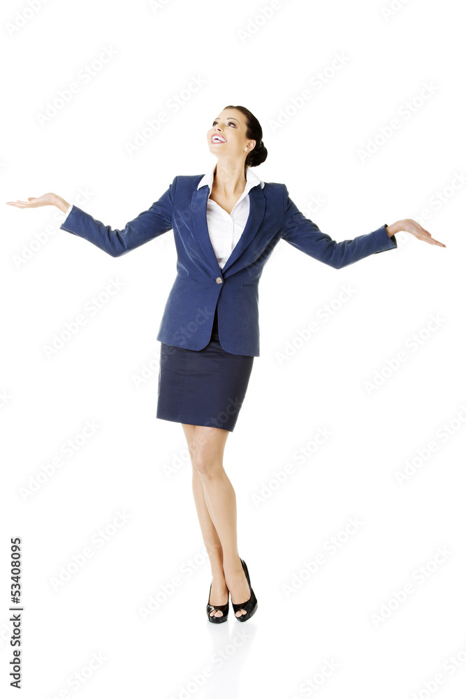 Happy young business woman showing copy space on her palm Happy young business woman showing copy space on her palm