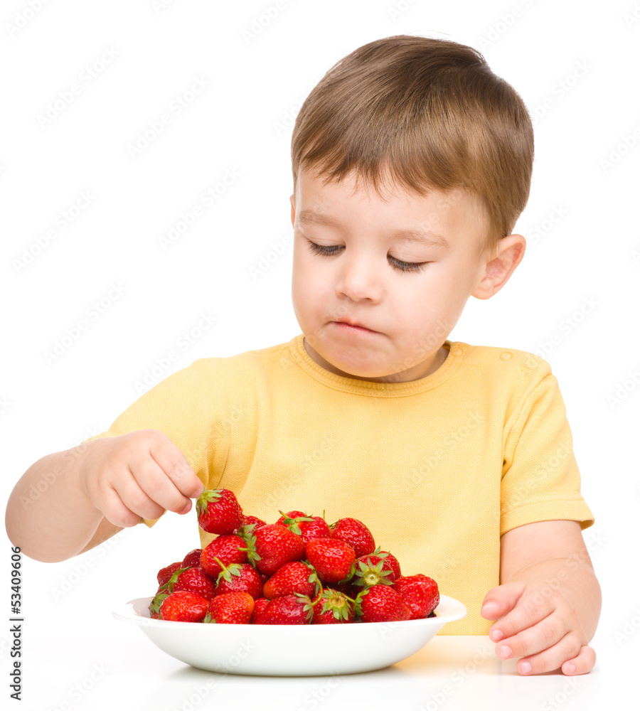 Little boy with strawberries Little boy with strawberries