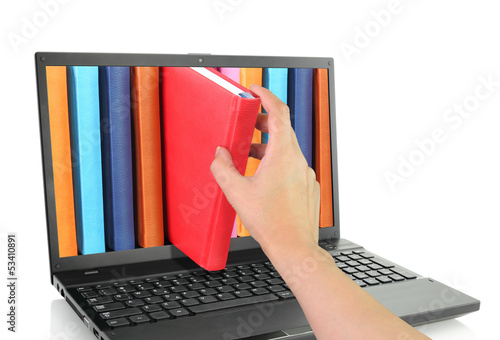 Laptop computer with colored books.