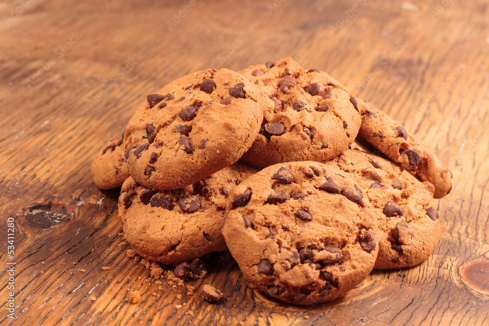 cookies with chocolate on wooden table cookies with chocolate on wooden table