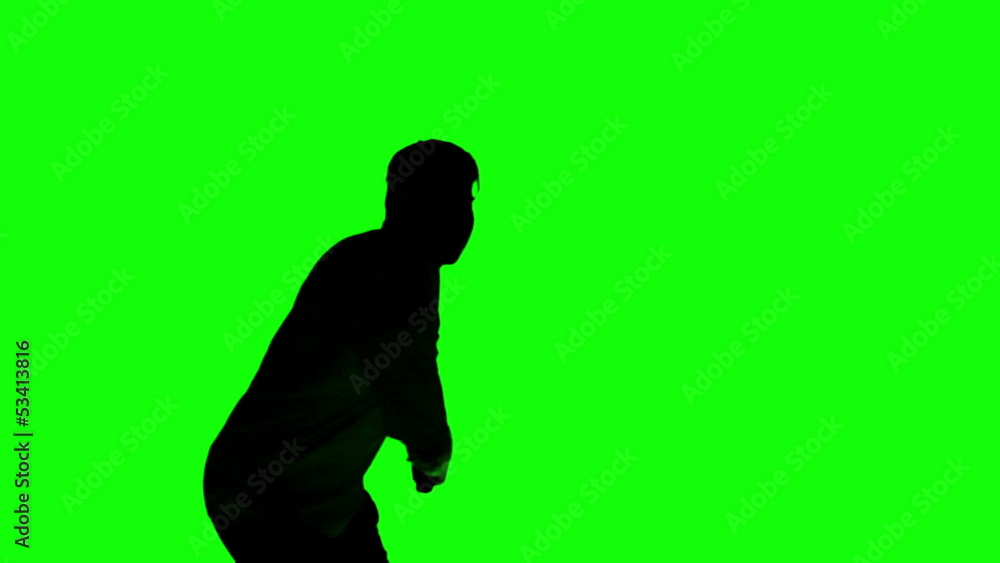 Silhouette of a man playing tennis on green screen Silhouette of a man playing tennis on green screen