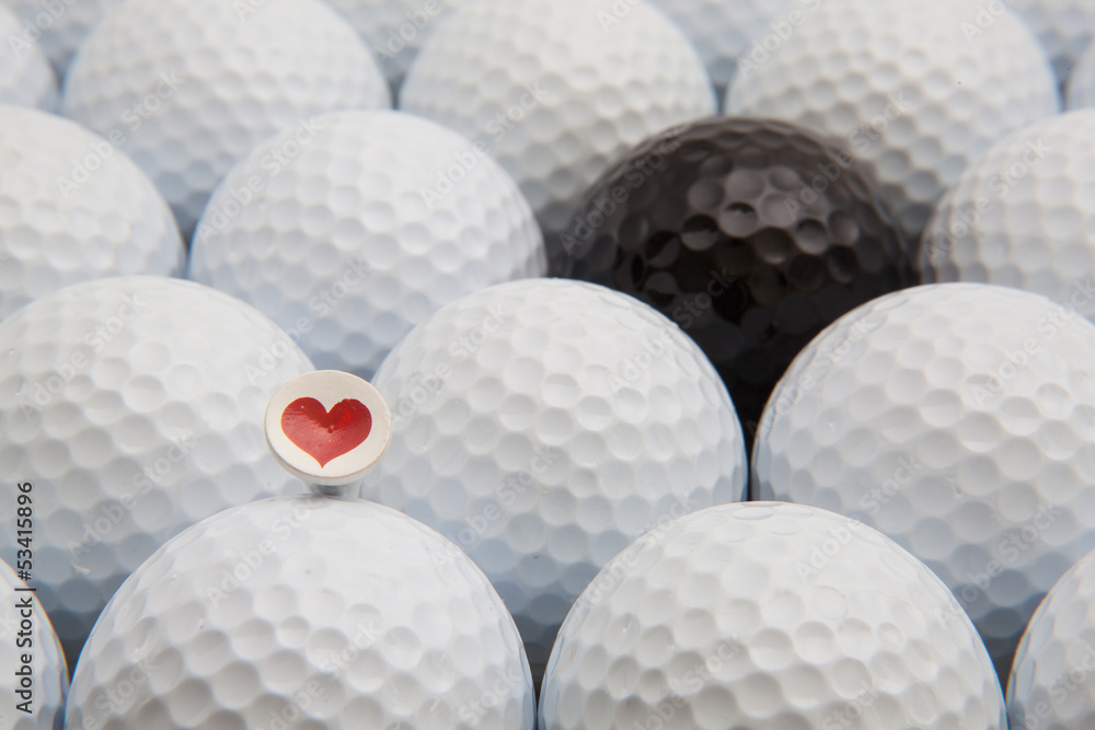 Different golf balls and romantic tee Different golf balls and romantic tee