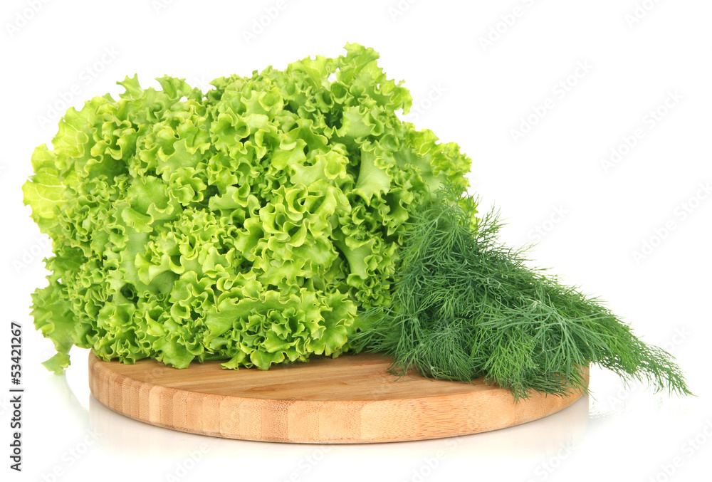 Useful herbs on wooden cutting board isolated on white Useful herbs on wooden cutting board isolated on white