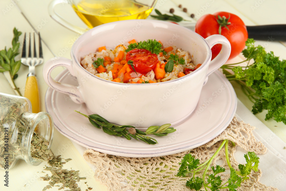 Delicious rice with vegetables and herbs in pot Delicious rice with vegetables and herbs in pot