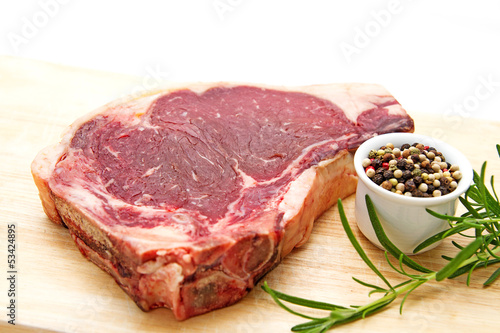 Raw dry aged t-bone steak