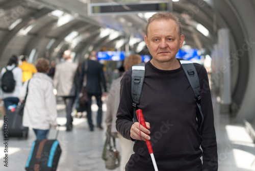 Visually impaired person in busy public places