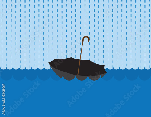 Umbrella floating in a large body of water