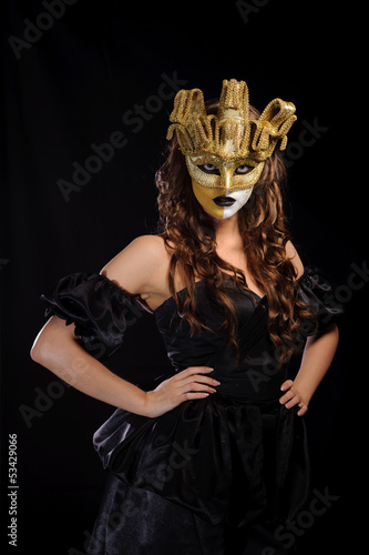 Woman in golden mask