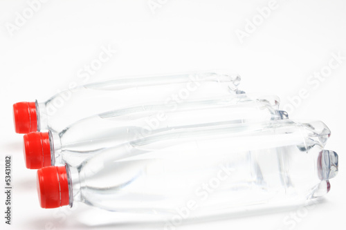 Water bottles with red cap