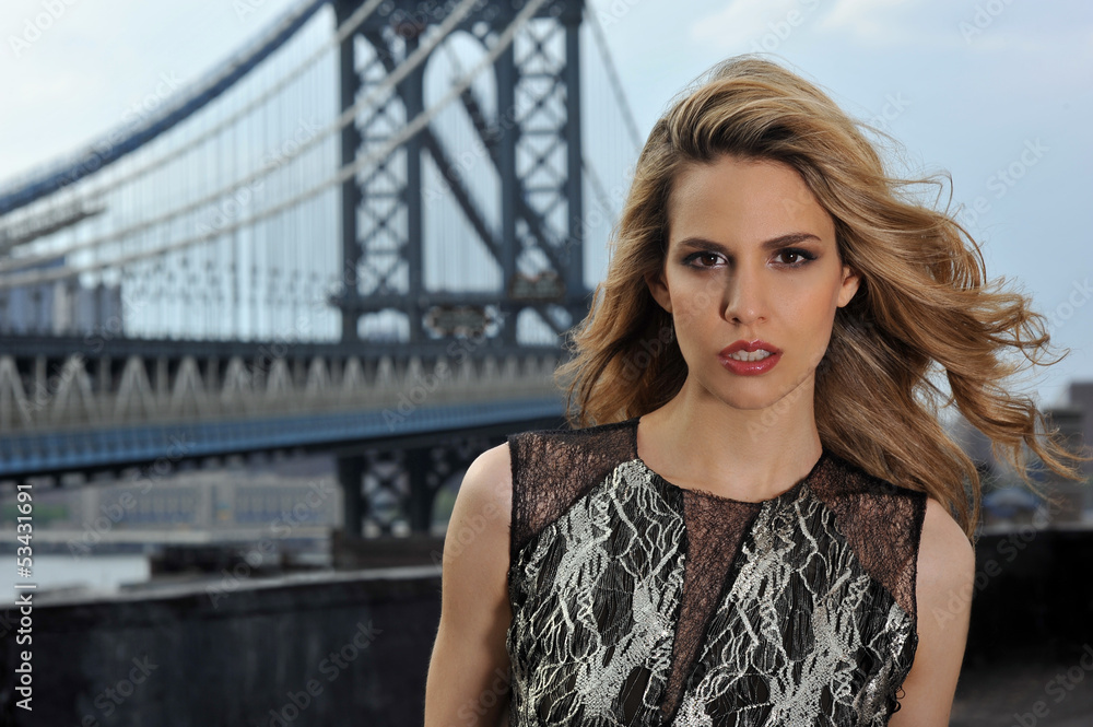 Portrait of fashion model posing on rooftop Portrait of fashion model posing on rooftop