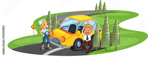 A car accident at the road near the pine trees