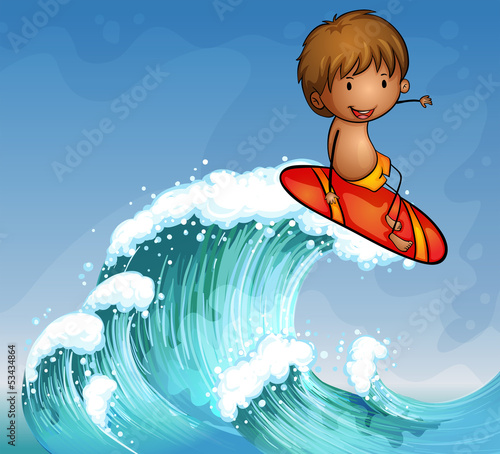 A boy surfing in the waves