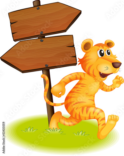 A tiger running and the empty signboards