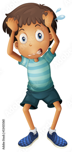 A boy scratching his head