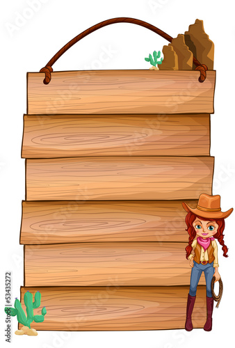 Empty wooden planks with a cowgirl