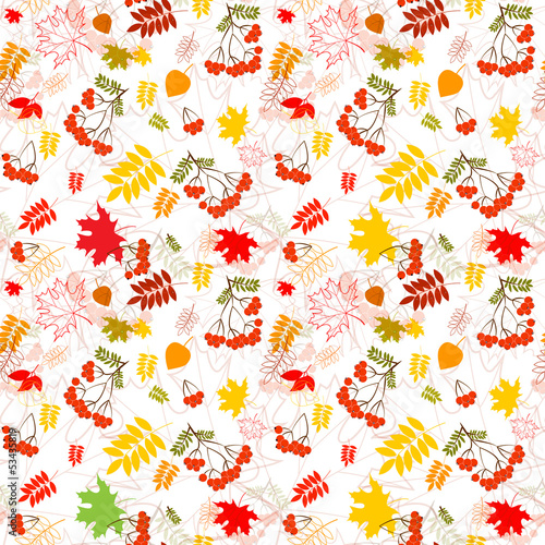A seamless leaf and rowanberrys pattern vector background. © olegganko