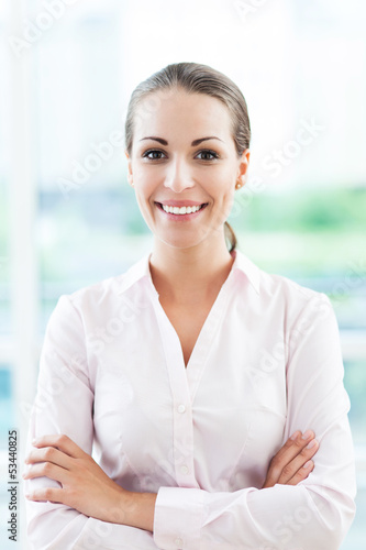 Young businesswoman smiling Free Download Young businesswoman smiling - GFXLoad