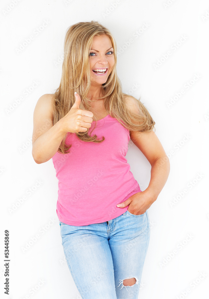 Happy young woman with thumbs up gesture Happy young woman with thumbs up gesture