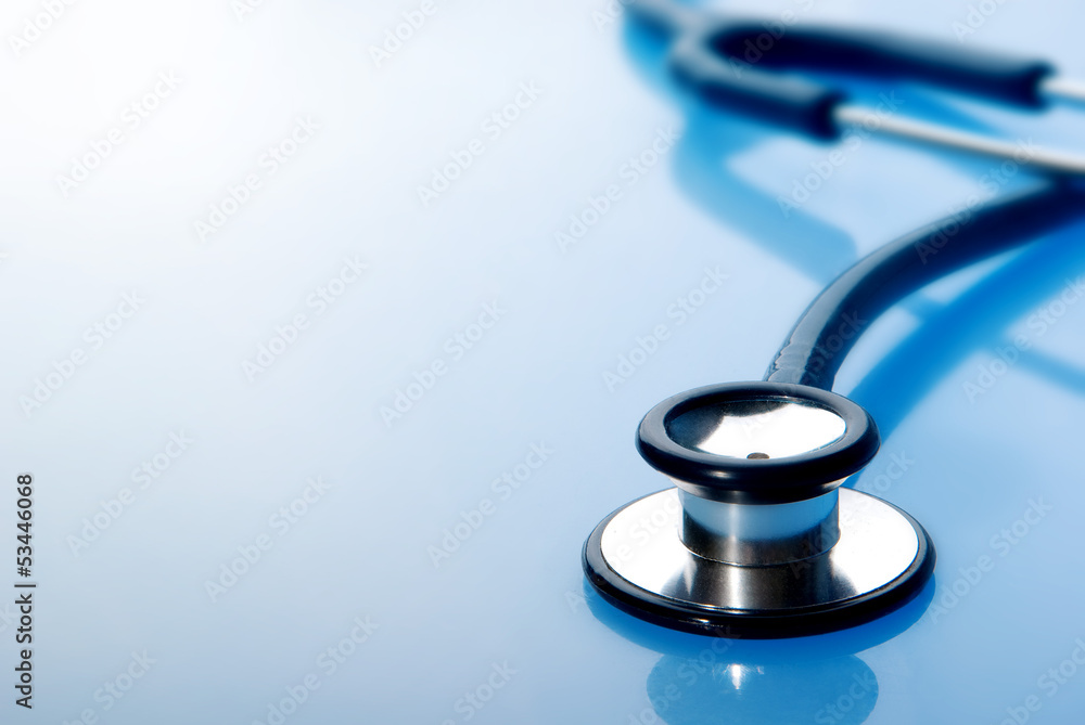 Stethoscope on blue background Stethoscope on blue background