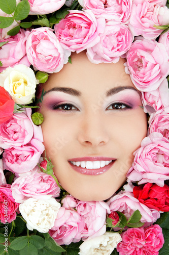 beautiful female face with flowers roses frame