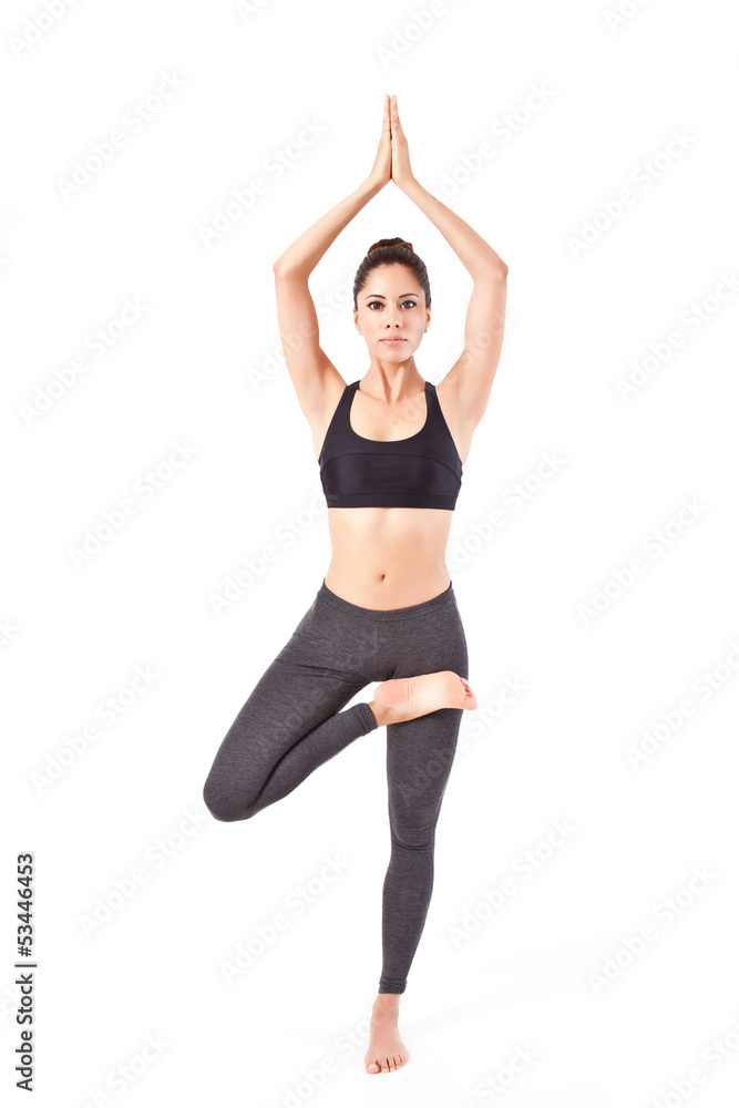 beautiful young woman making a Yoga pose beautiful young woman making a Yoga pose