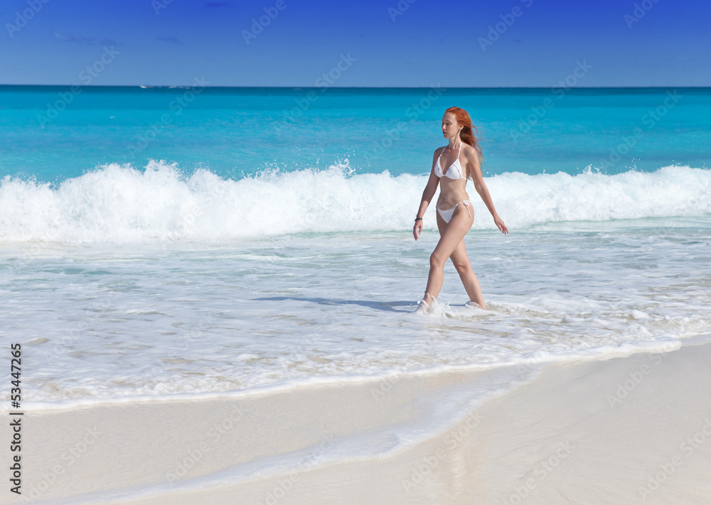 The young attractive woman on the sea coast The young attractive woman on the sea coast