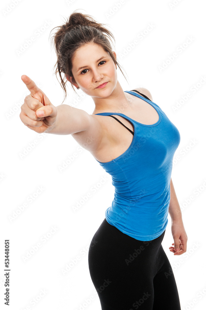 Pretty teenage girl pointing finger at camera. Pretty teenage girl pointing finger at camera.