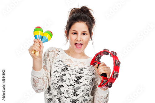 Fotografia, Obraz Teenage girl with tambourine and maracas.