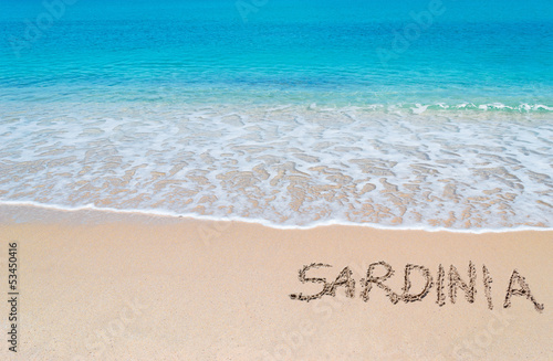 turquoise foreshore with "Sardinia" written on it
