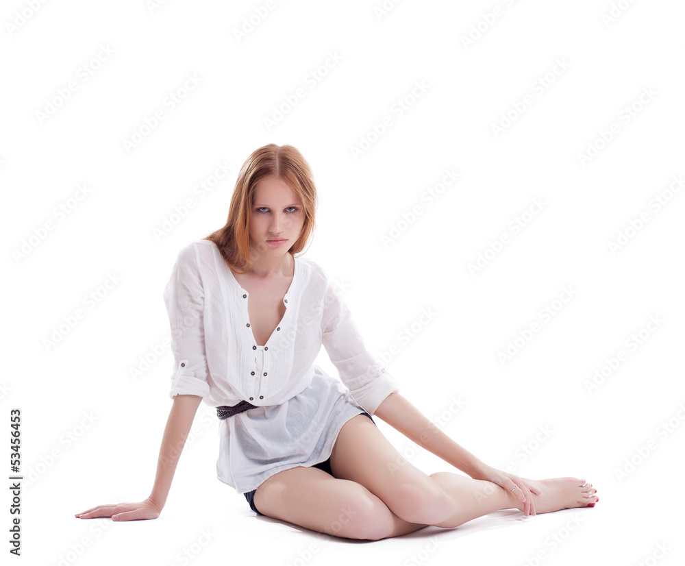 Pretty slim model with red hair posing in studio Pretty slim model with red hair posing in studio