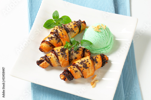 Chocolate crescent rolls with ice cream photo