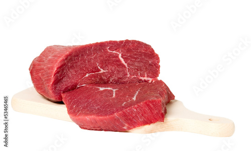 Obraz na płótnie Raw sliced meat on cutting board w salonie