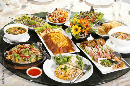 meal time, many kind of food dish put on round table