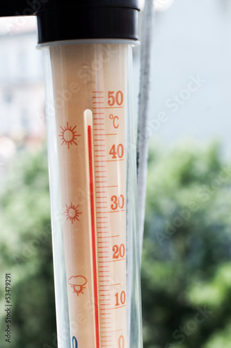 summer heat thermometer on balcony