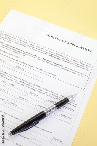 Close up of a mortgage application and a pen