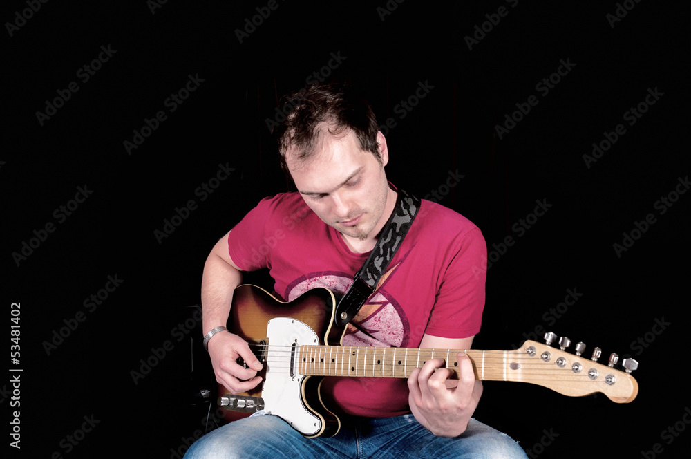 Obraz premium Man playing guitar