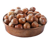 hazelnuts in copper bowl isolated