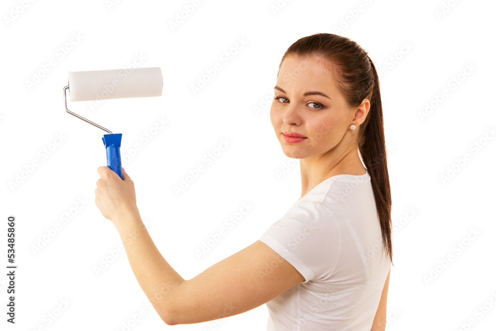 The woman with the roller in hand it is isolated on white backgr The woman with the roller in hand it is isolated on white backgr