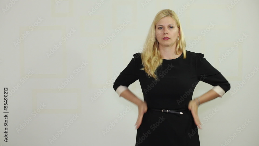 Uncomfortable businesswoman loosening her dress Uncomfortable businesswoman loosening her dress