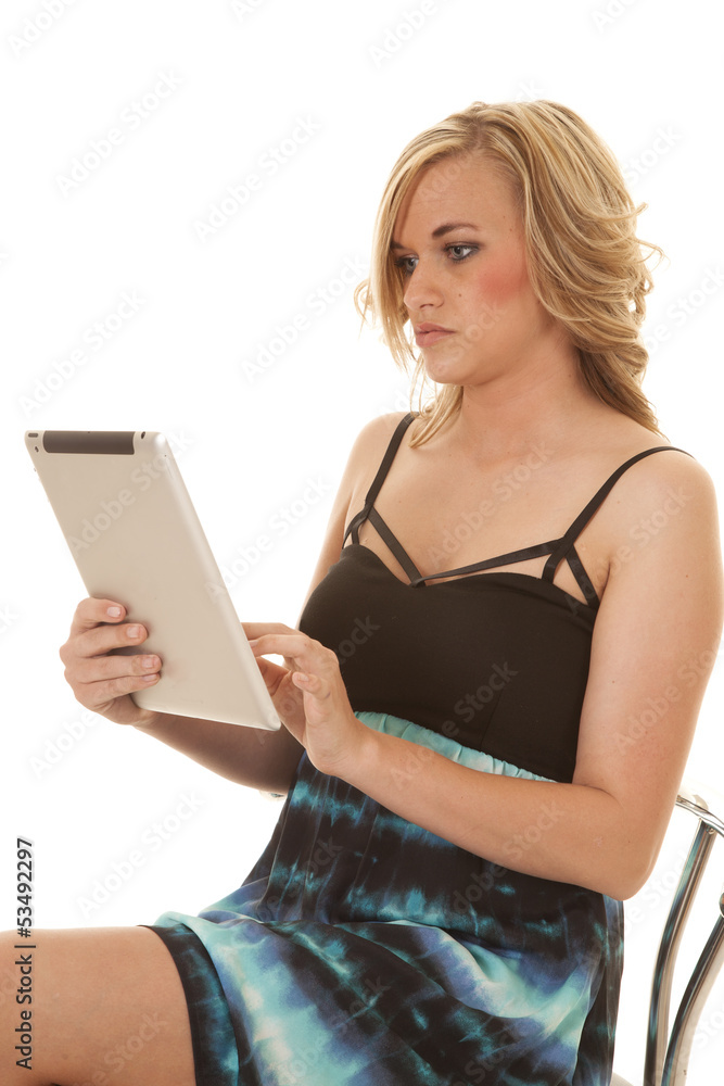 woman blue dress and black tablet