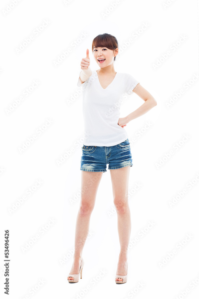 Young Asian woman showing thumb. Young Asian woman showing thumb.
