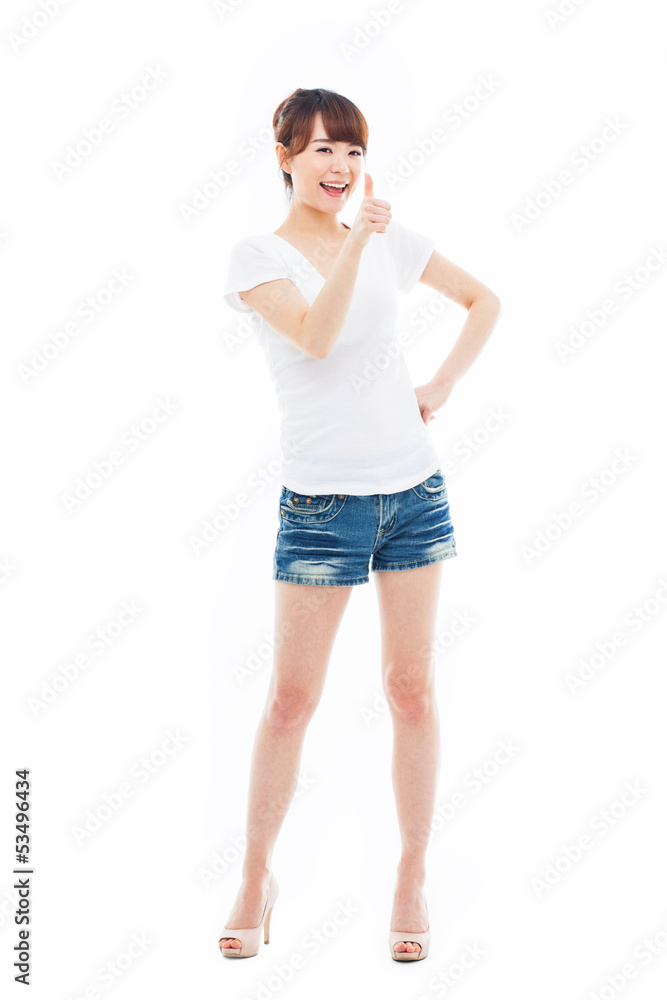 Young Asian woman showing thumb. Young Asian woman showing thumb.
